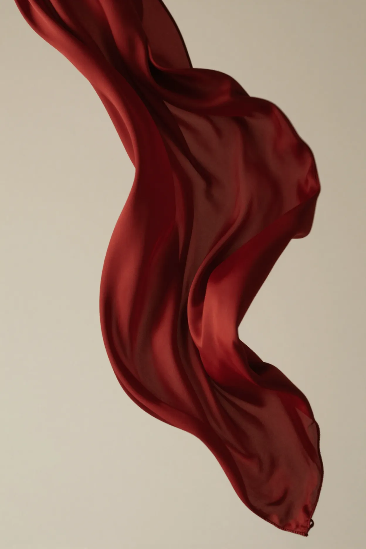 Scarlet silk caught in motion